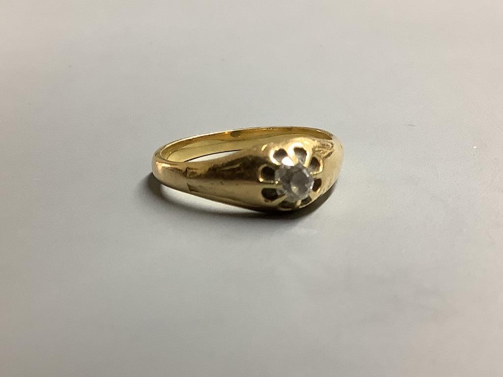 A yellow metal and claw set solitaire diamond ring, size P/Q gross 4.8 g.